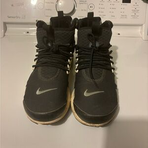 Black Nike running shoe